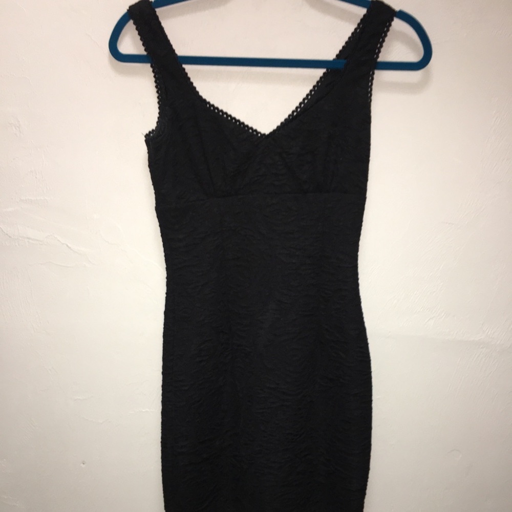 Tight black v-cut dress